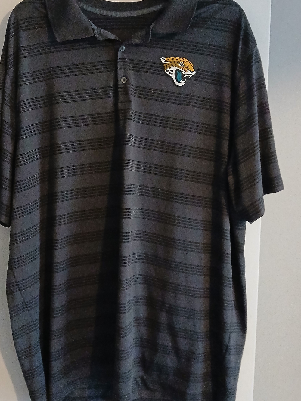 Men's Jacksonville Jaguar Black Striped Polo Shirt with Team Logo